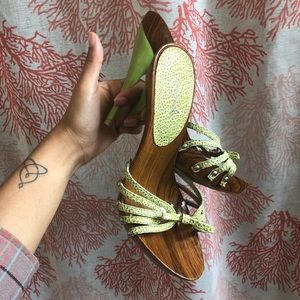 green wooden sandals